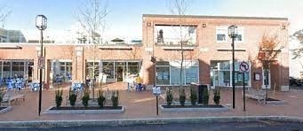 a building on the side of a street