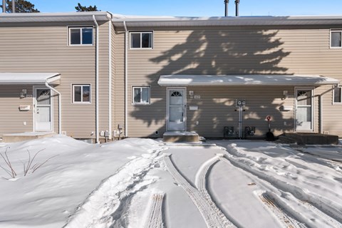 the front of a building in the snow