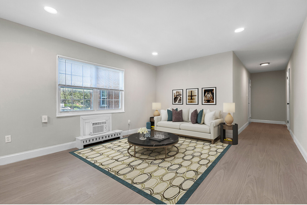 a living room with a couch and a table