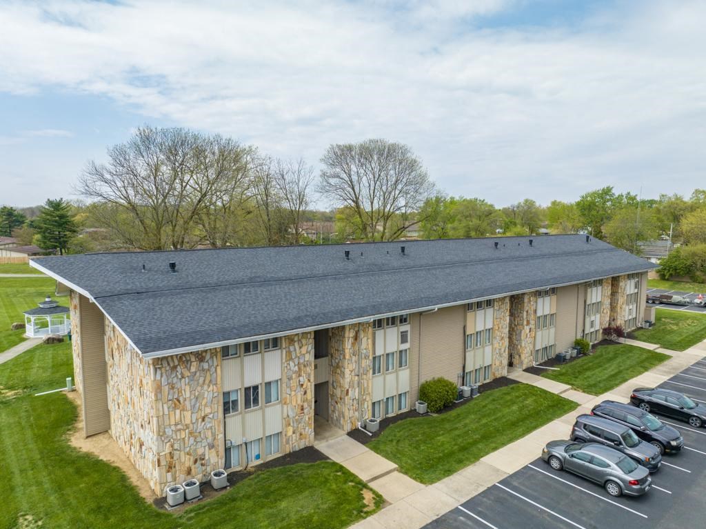 the building where the motel is located is shown with a parking lot