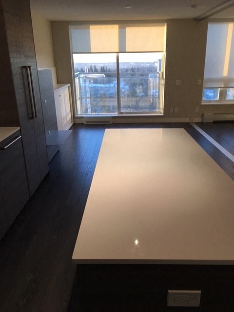 a living room with a white table in the middle