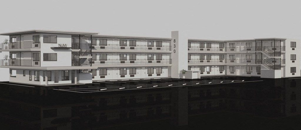 a black and white photo of some apartment buildings