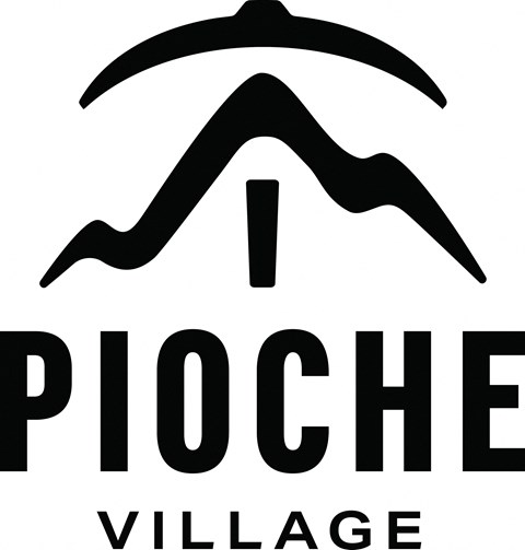 the logo for pico village with an icon of an evil eye