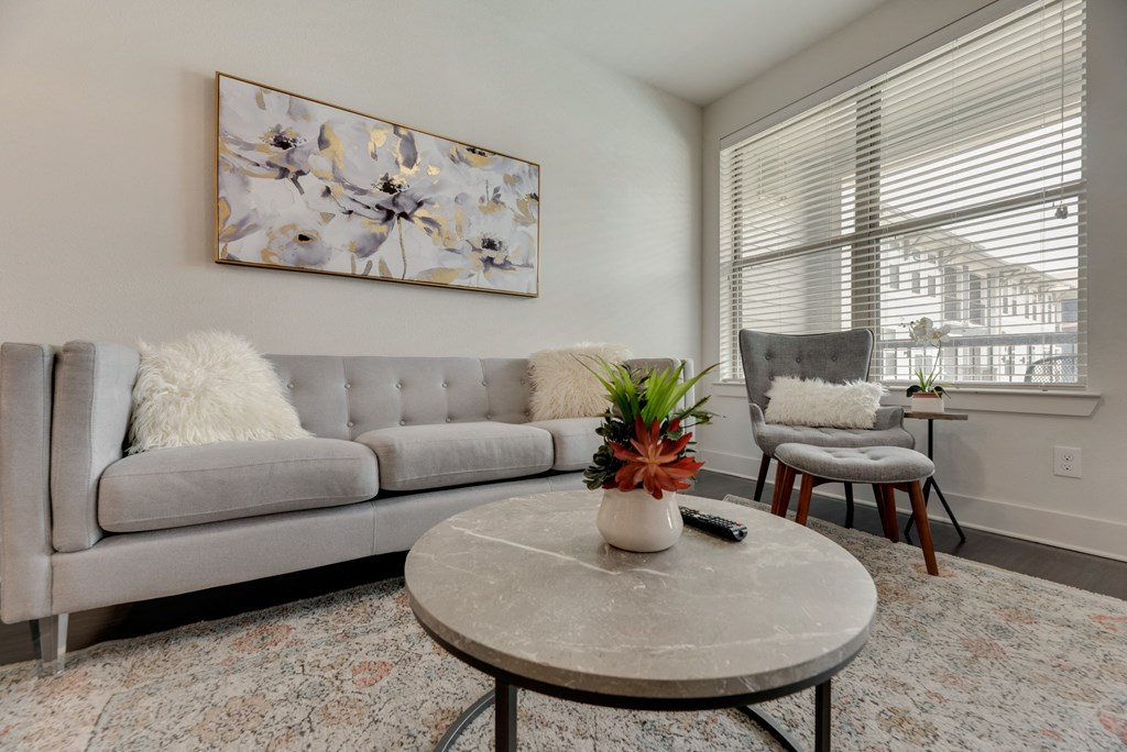 a living room with a couch and a coffee table