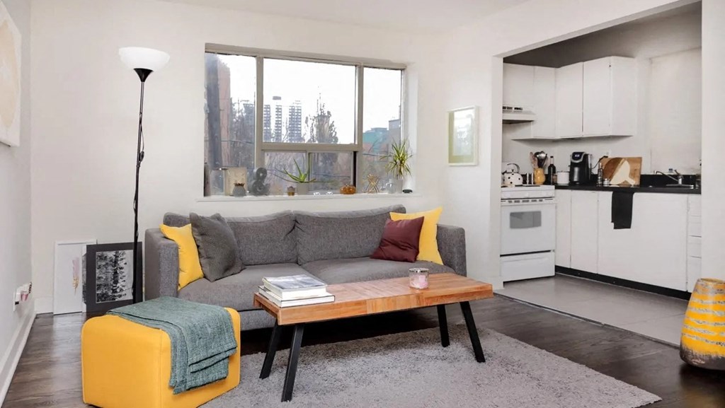 a living room with a couch and a table