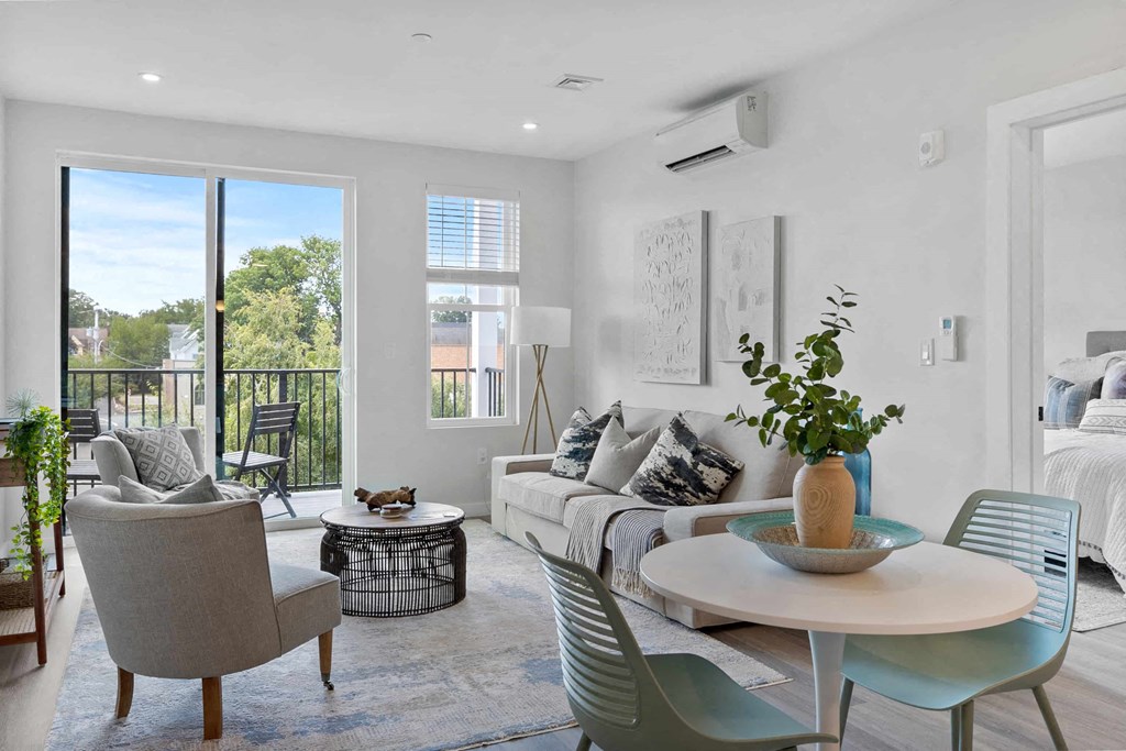 a living room with a couch and a table