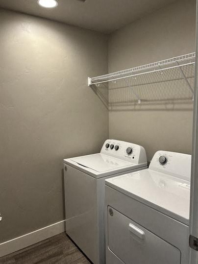 A laundry room with a washer and dryer.