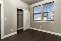 A room with a door and a window.