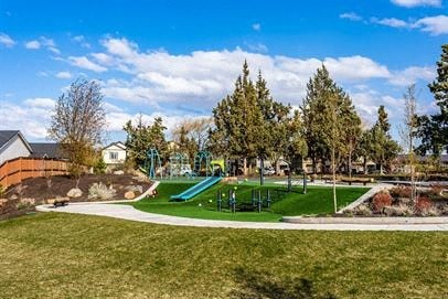 a park with a playground and trees