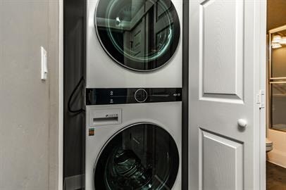 A modern washing machine is built into a wall.