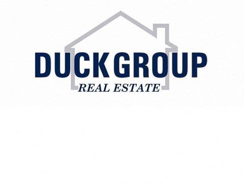 a logo for a real estate company called duck group real estate