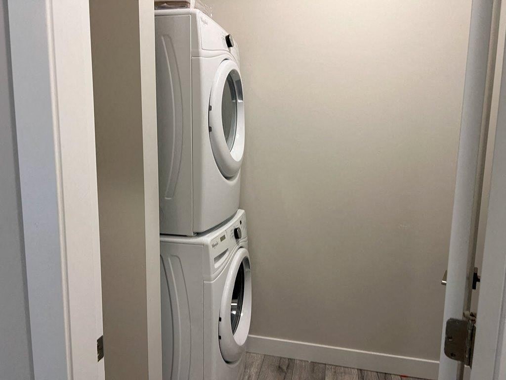 a washer and dryer in a room with a door