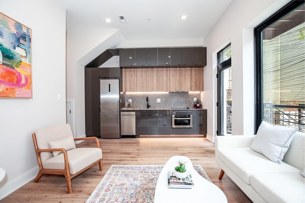a living room with a couch and a table