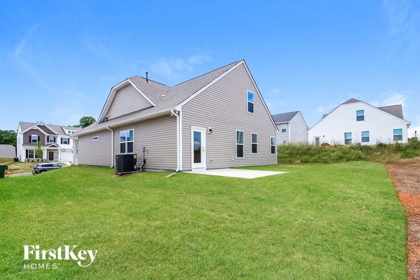 a house with a yard in front of it