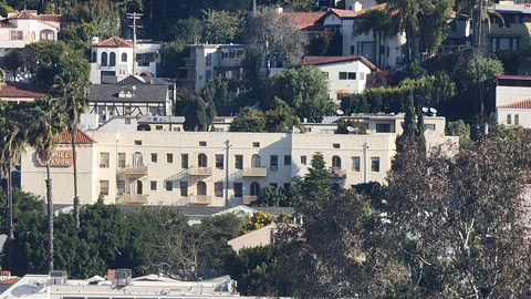 a view of a city with houses and trees