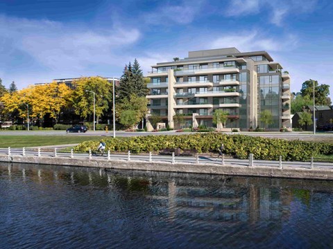 a view of a building from the water
