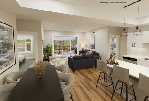A modern living room with a black dining table and grey chairs.