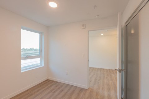 A room with a door and a window.