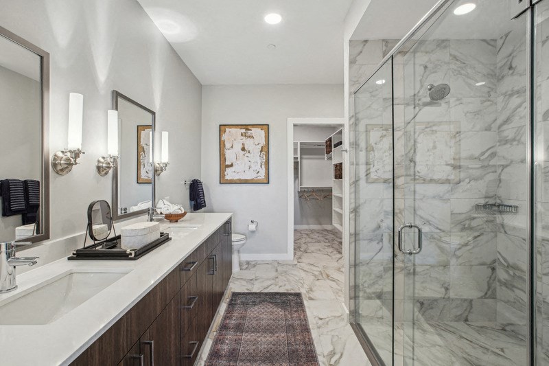 a bathroom with a sink and a shower