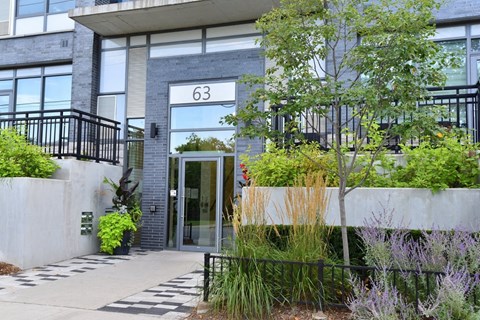the front of a building with a glass door