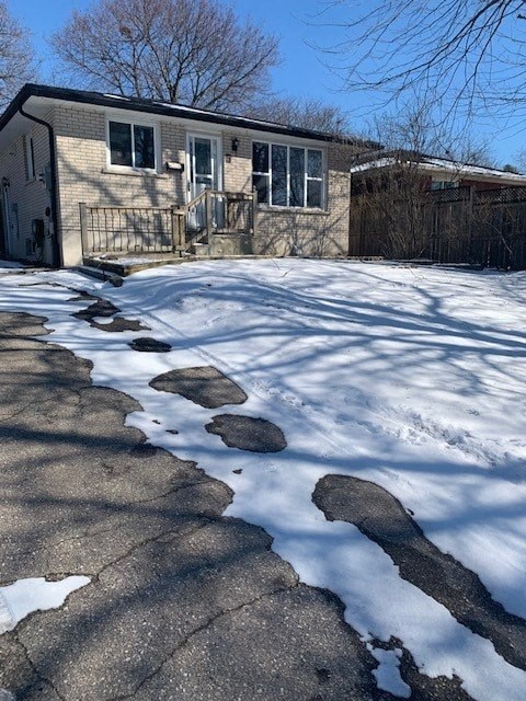 a house with snow on the ground