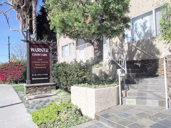 a building with a council sign in front of it