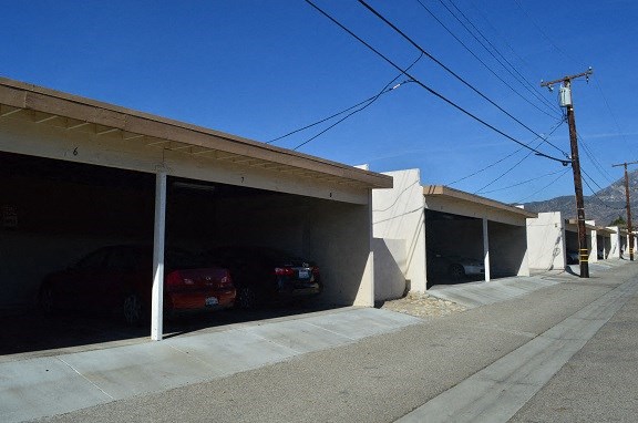 a couple of cars parked in a parking garage