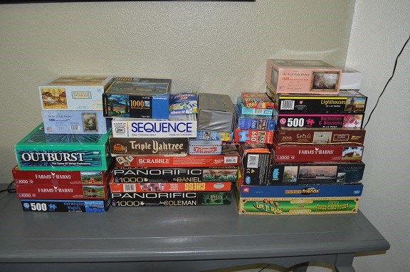a pile of video games on a table