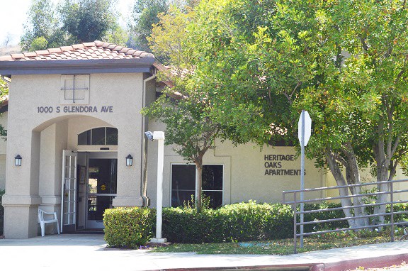 a building with a stop sign in front of it
