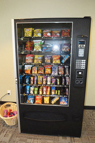 a vending machine filled with different kinds of snacks