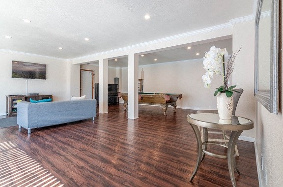 a living room with a table and a couch