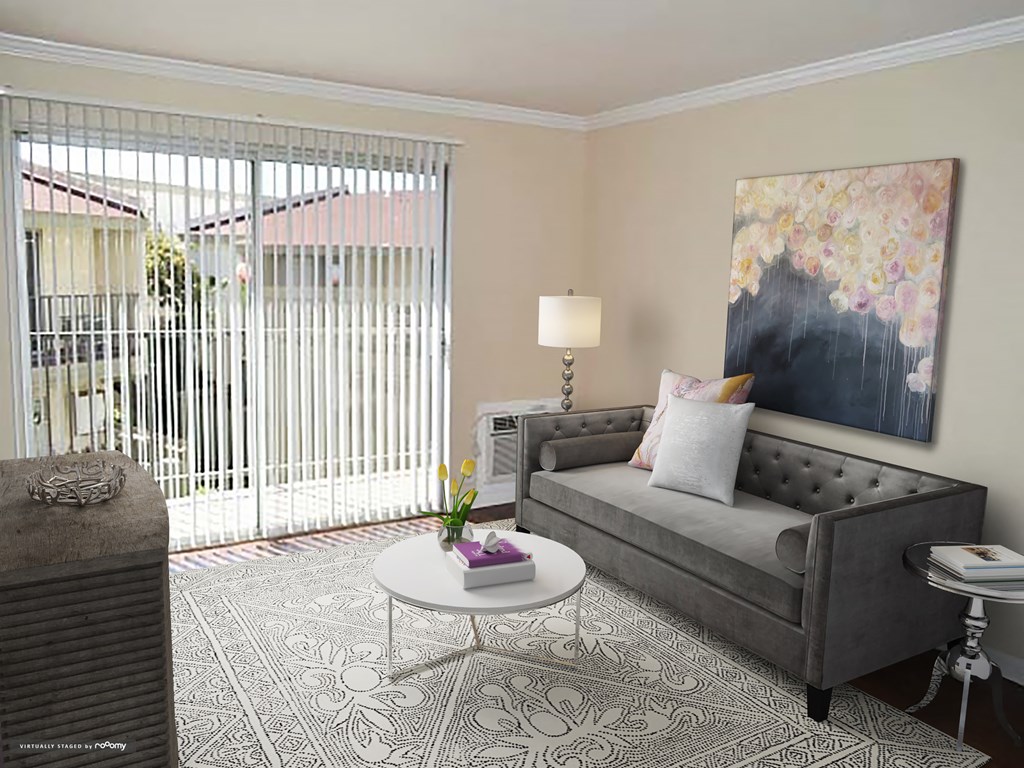 a living room with a couch and a table