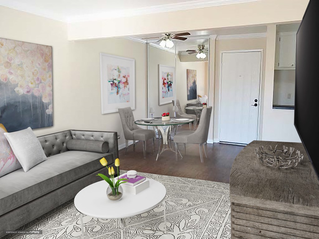 a living room with a couch and a table