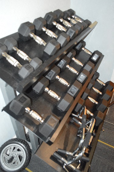 a display of electronic equipment on a table with a wheel