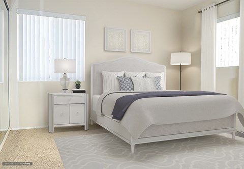 a bedroom with a bed and a night stand