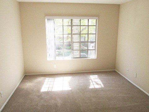 an empty room with a window in it
