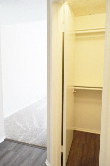 an open door to a room with a closet