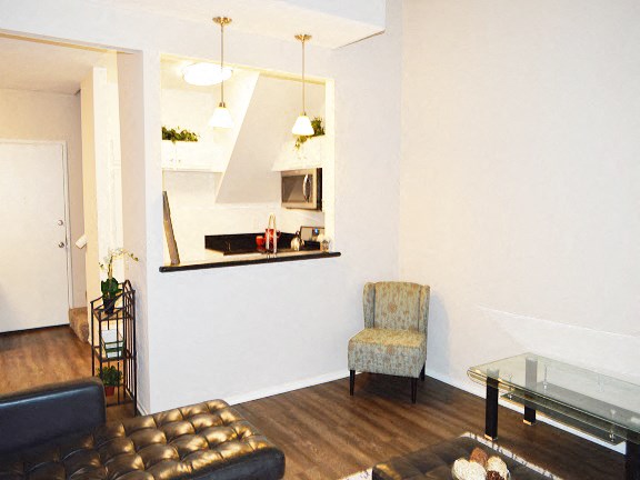 a living room with a couch and a table