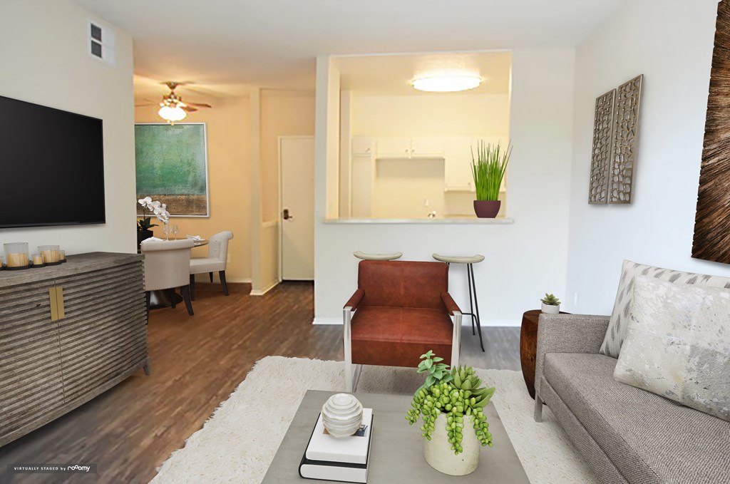 a living room with a couch and a table