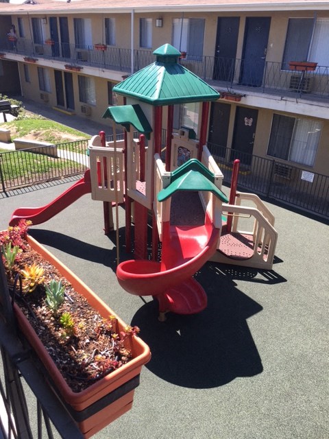 a childrens playground in an apartment building