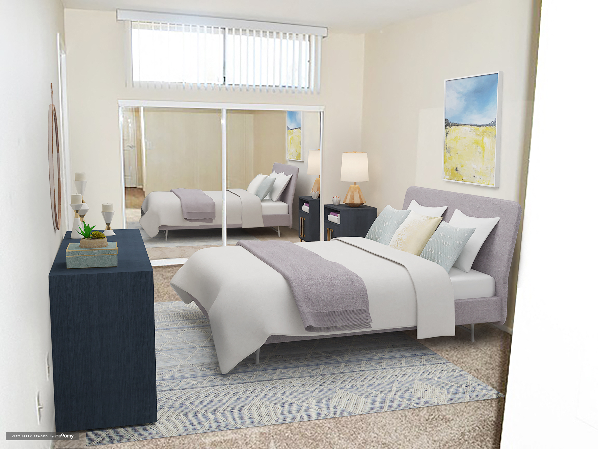 a bedroom with a bed and a mirror