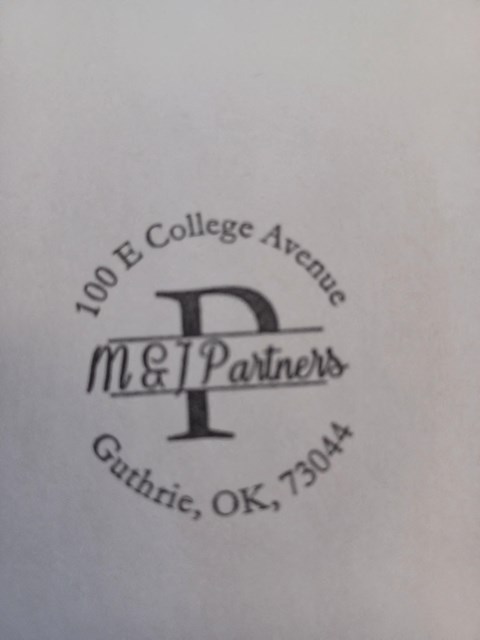 a piece of paper with a logo for a company called metal partners