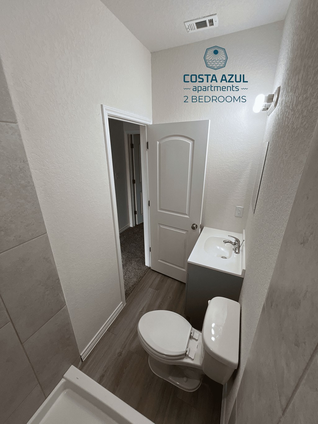 a small bathroom with a toilet and a sink