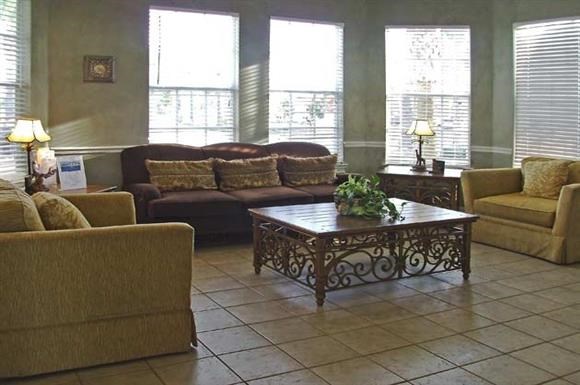 a living room with couches and a coffee table