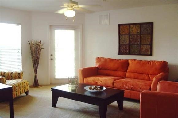 a living room with a couch and a coffee table