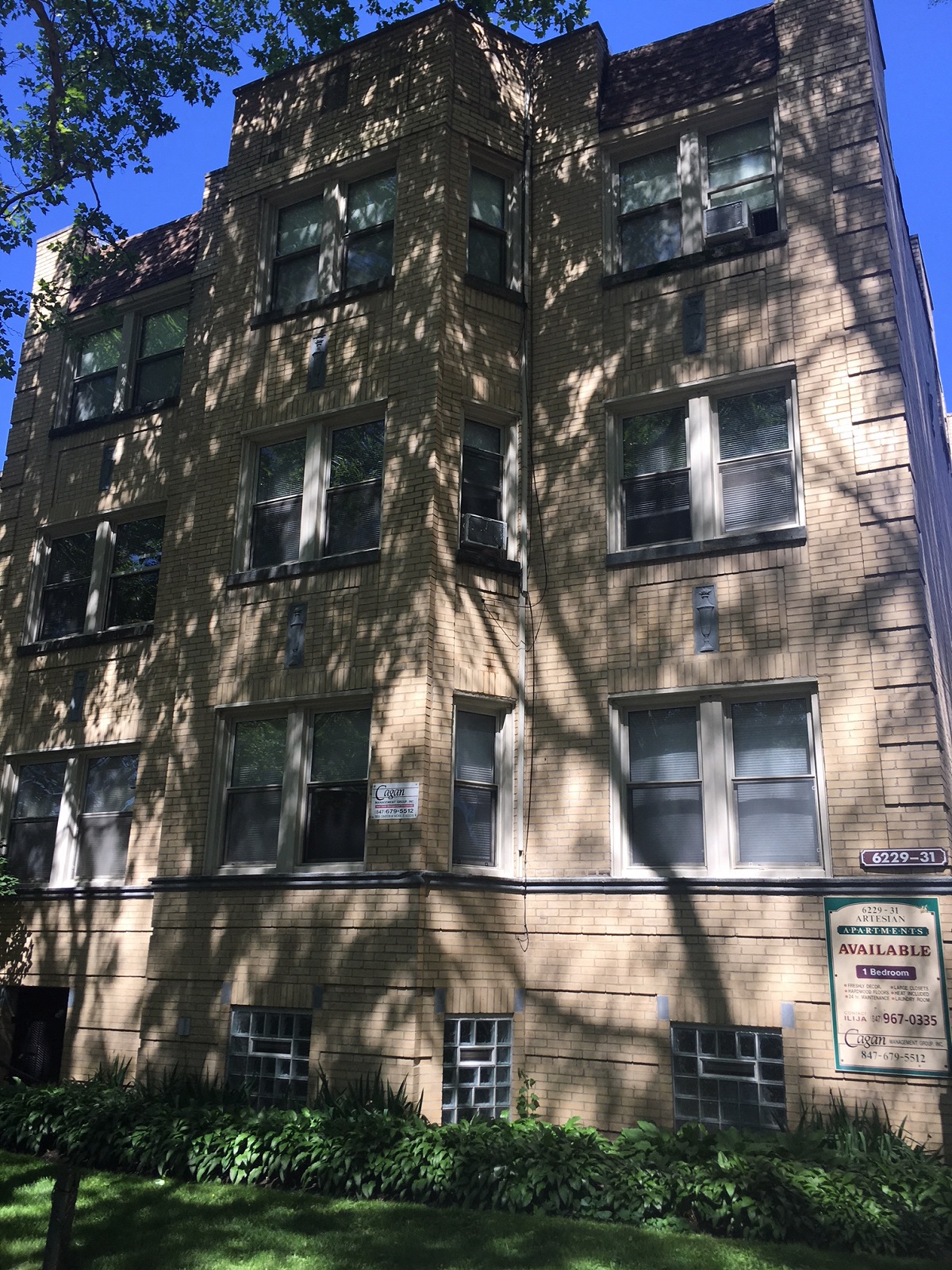 the facade of a building with shadows on it