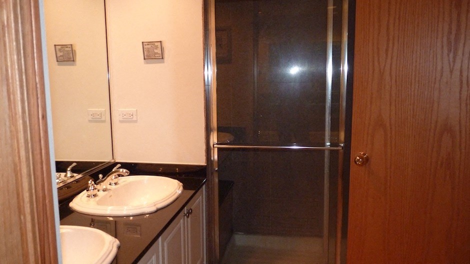 a bathroom with a sink and a shower