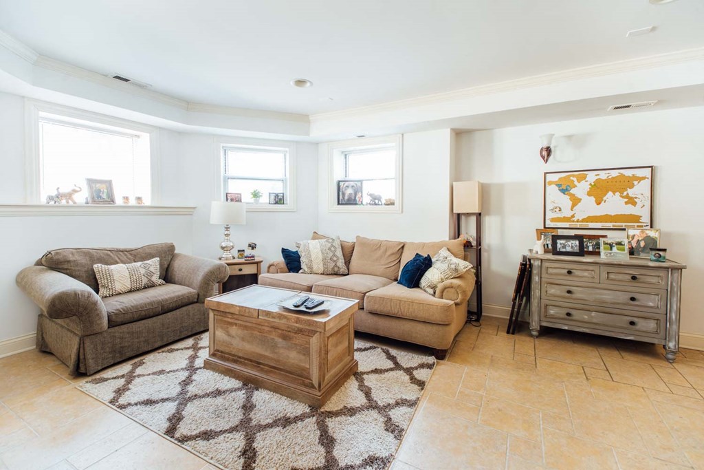 a living room with two couches and a coffee table