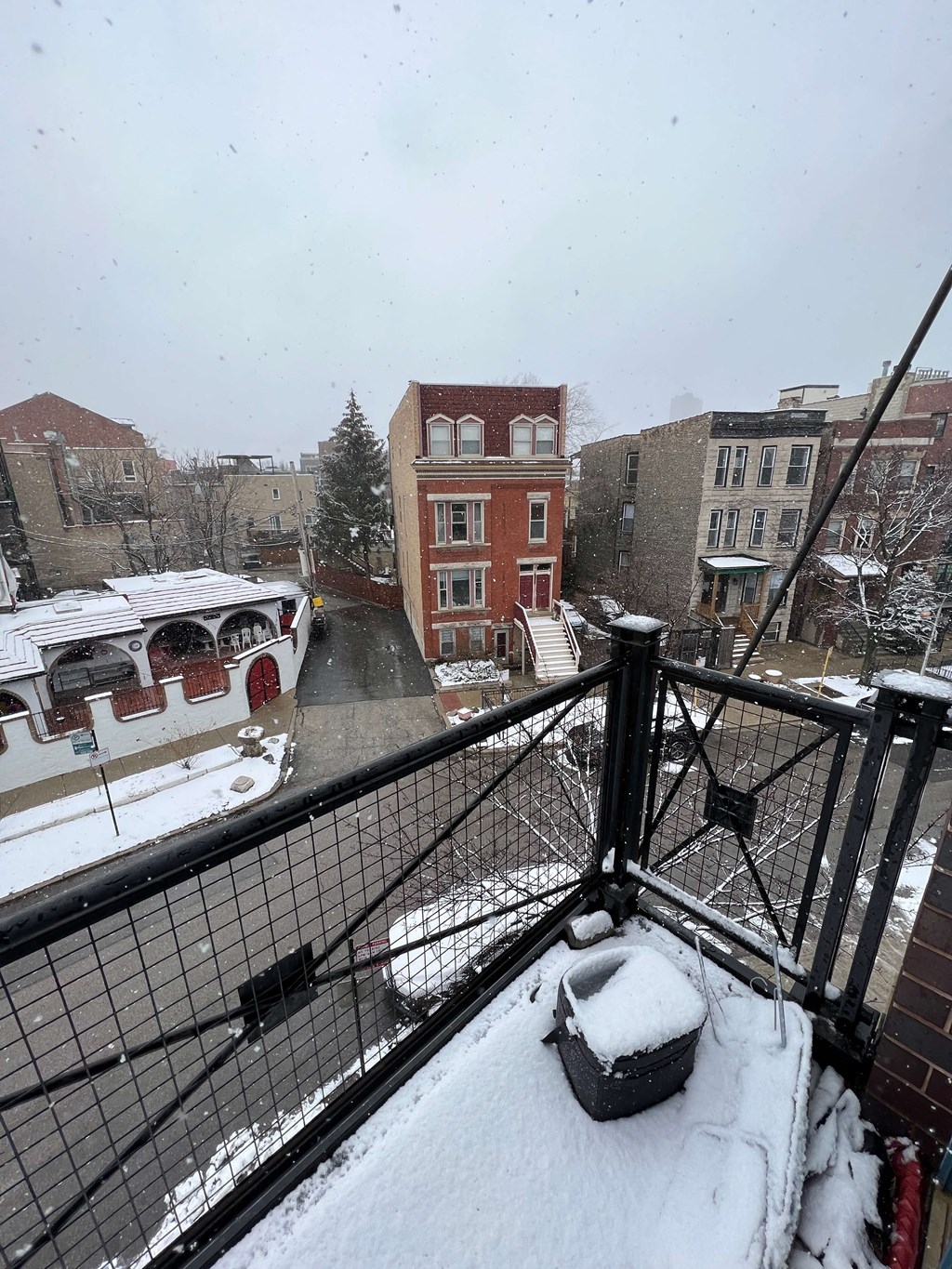 the view from the balcony of a boat in the snow