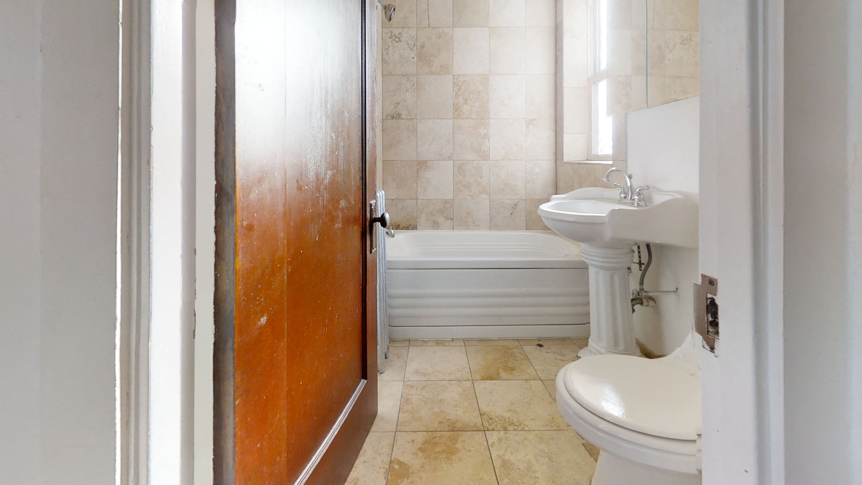 a small bathroom with a toilet and a sink